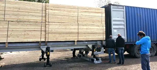 Loading wood in container